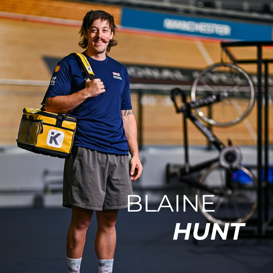 Great British Cyclist Blaine Hunt at the velodrome carrying the Yellow Kitbrix Hero Bag.