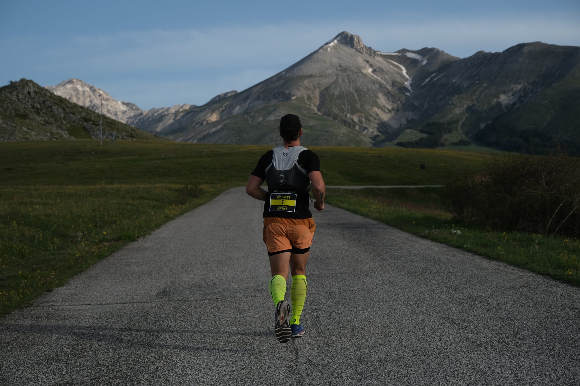 Alessandro running towards the Italian mountains, supported by KitBrix