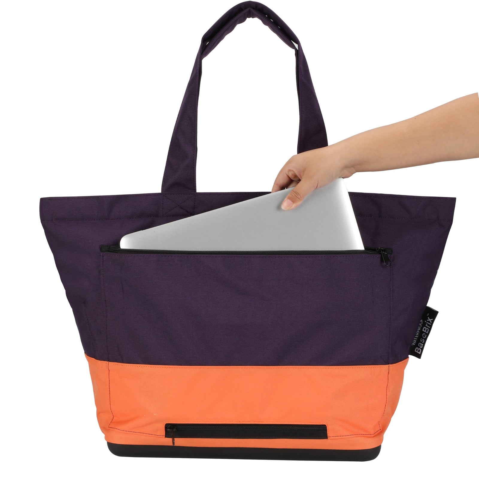 Extra large tote bag. Featuring a hugely spacious inside with a pocket for valuables, water bottle holder, and outside pocket to fit a laptop or for use as a slide over handle for carrying on a luggage handle.