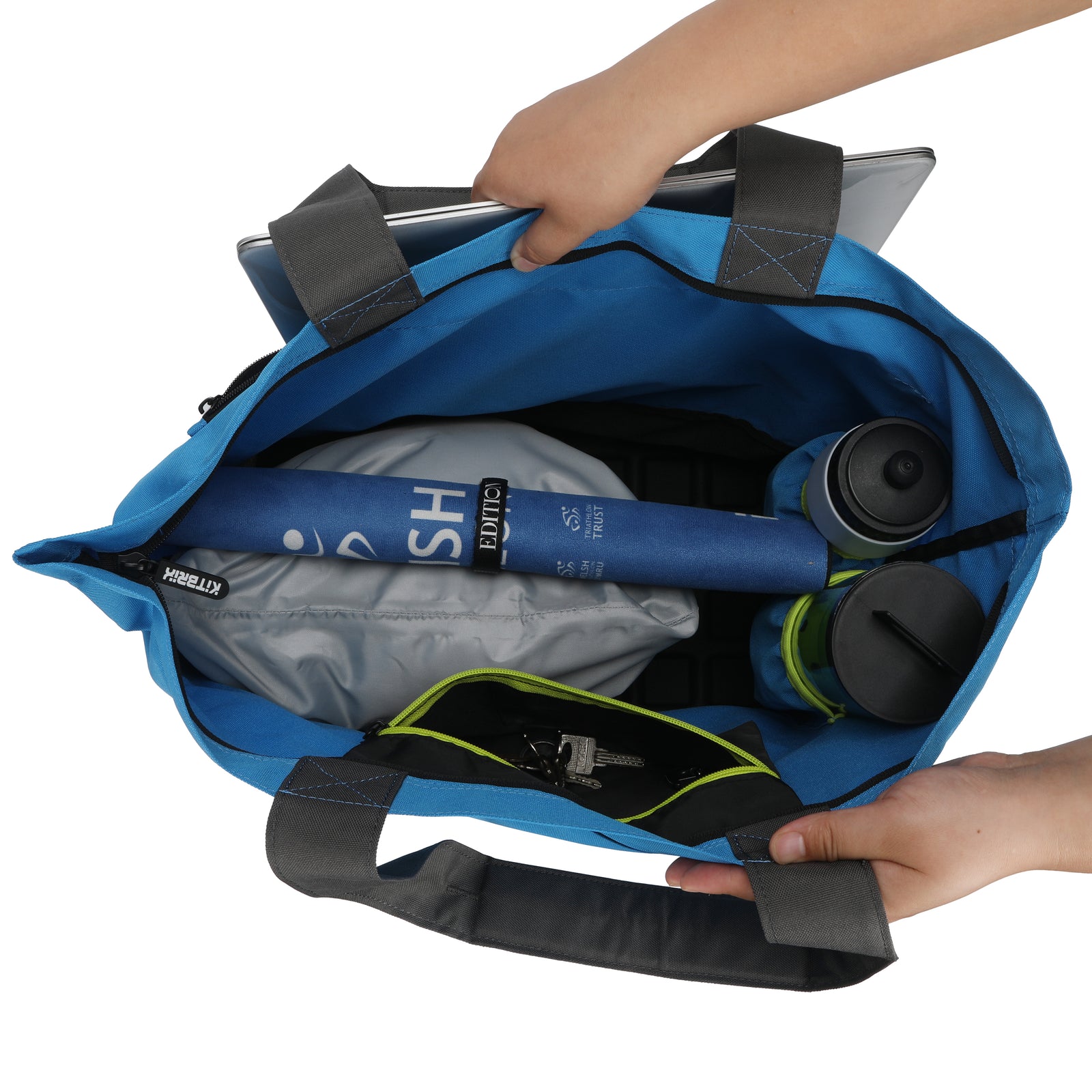 Spacious tote for carrying tennis rackets, balls, and gear