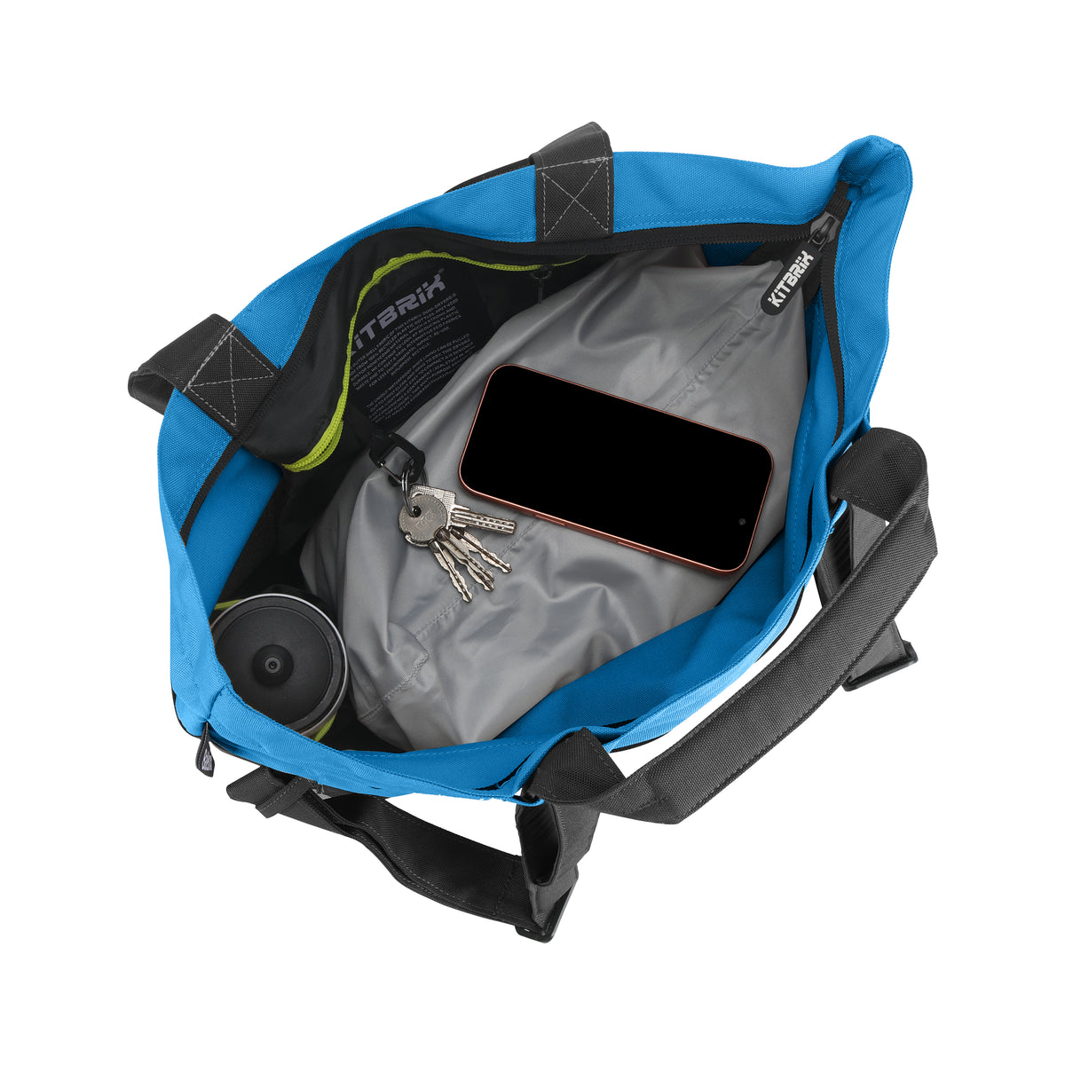 Blue and black travel bag with a big compartment for a phone, keys, and other items.