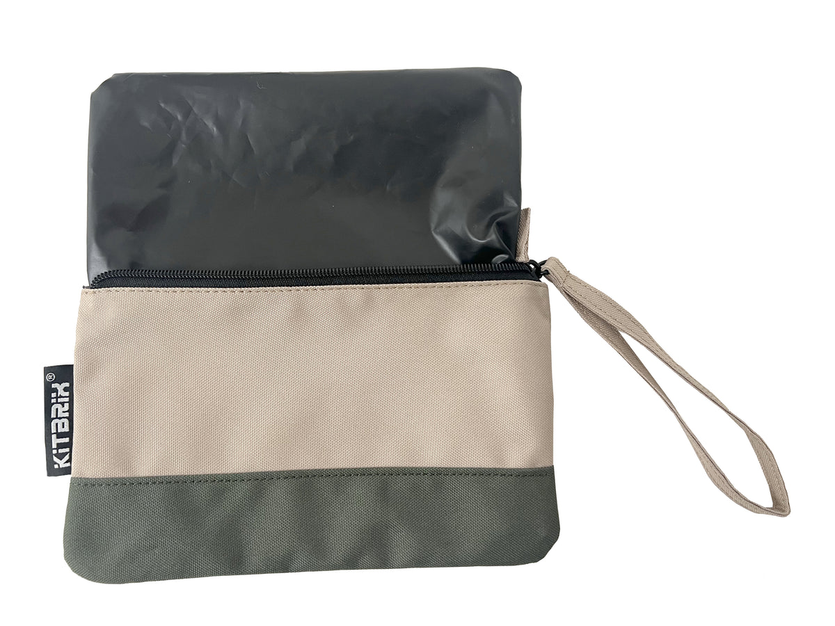 Duo-color pouch designed for pocket-handkerchief storage with wrist strap for easy carrying.