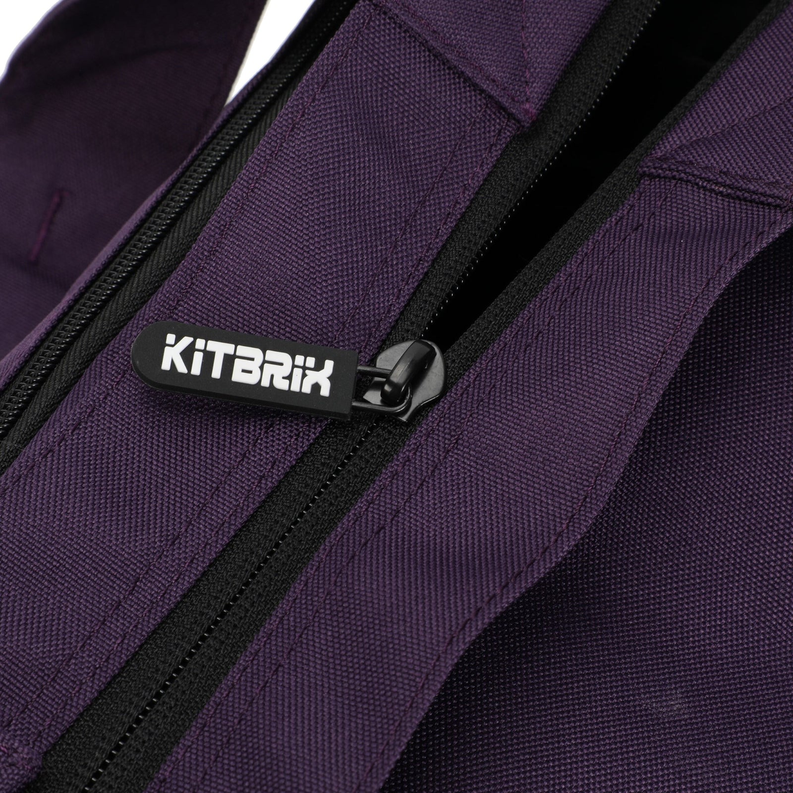 Large tote bag with a durable, black, full-length zip to securely protect your personal belongings.