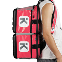  Two KitBrix bags zipped together, emphasizing the waterproof
and expandable features for triathletes.