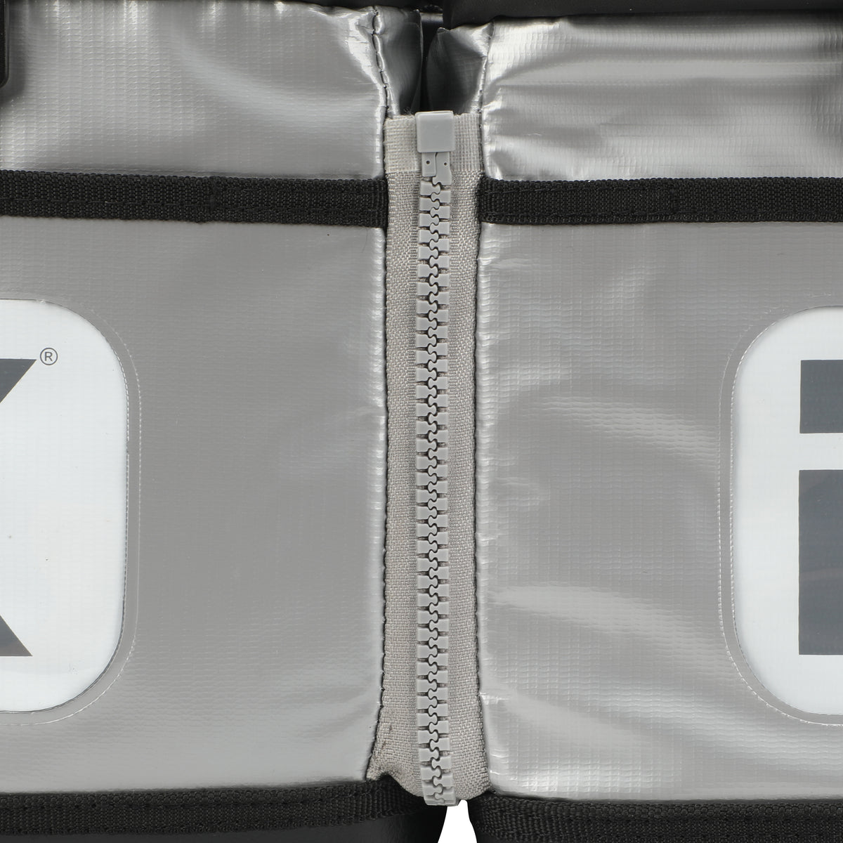 Close-up of the zip system connecting the two components of the transition bag.